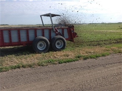 Horizontal beater spreader in use.