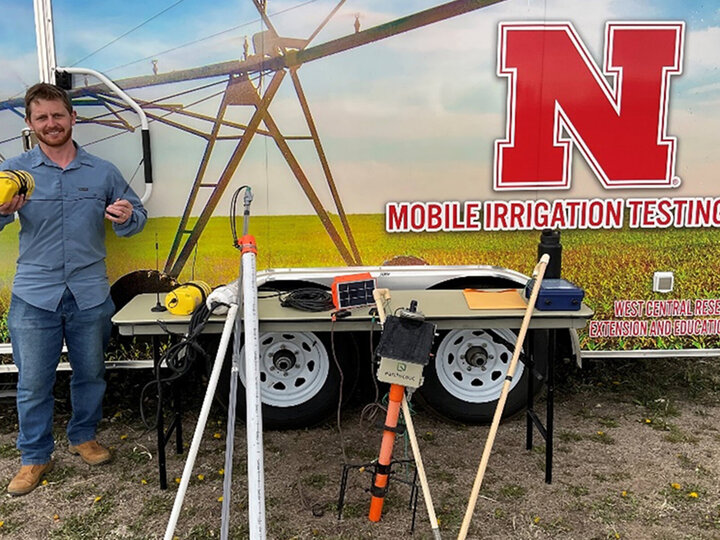 man stands near mobile lab