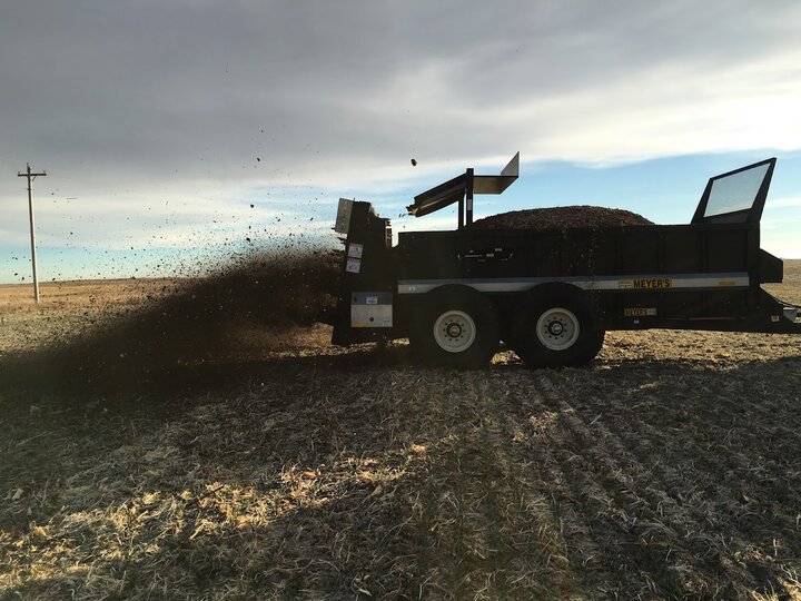 spreading manure