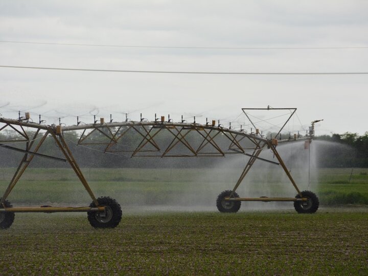 Center pivot irrigation system with a leak at the end tower