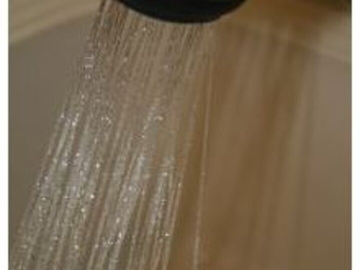 Water spraying from a faucet