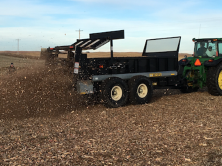 spreading woody biomass