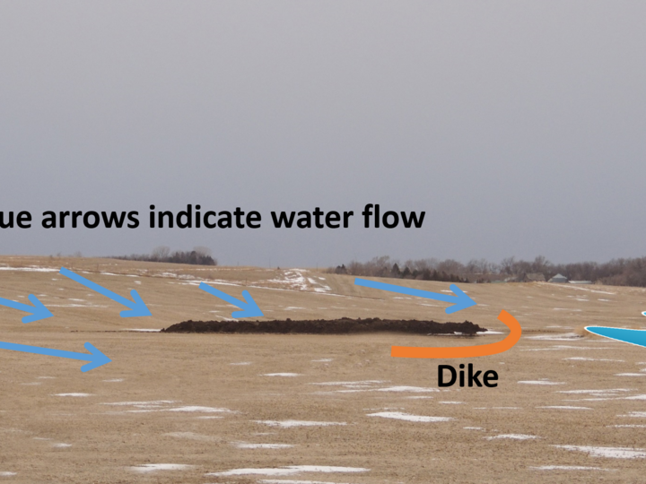 manure stockpile with markup showing where to place a dike