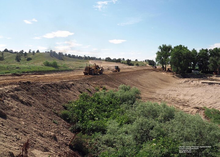 Dirt work is underway to repair the area where the Goshen/Gering-Ft. Laramie canal breached its sidewall July 17, 2019 flooding nearby farmland.